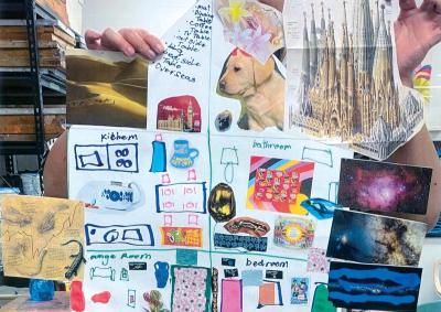 A person is holding up a mixed media collage. The artwork represents how the artists would like their Supported Independent Living (SIL) home to be. It is a drawing of a house with sections for the kitchen, bedroom, bathroom and lounge room with pasted magazine and drawn images belonging to each of the rooms. Around the house are pictures of a dog, a desert, Big Ben, space and a large, spired building. 